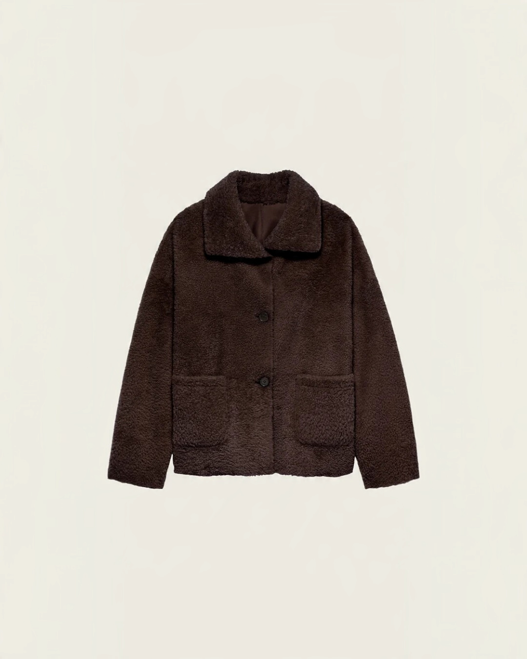 Manteau réversible Arma Isabella en shearling marron grain de café avec poches plaquées, disponible chez Merci Paris
