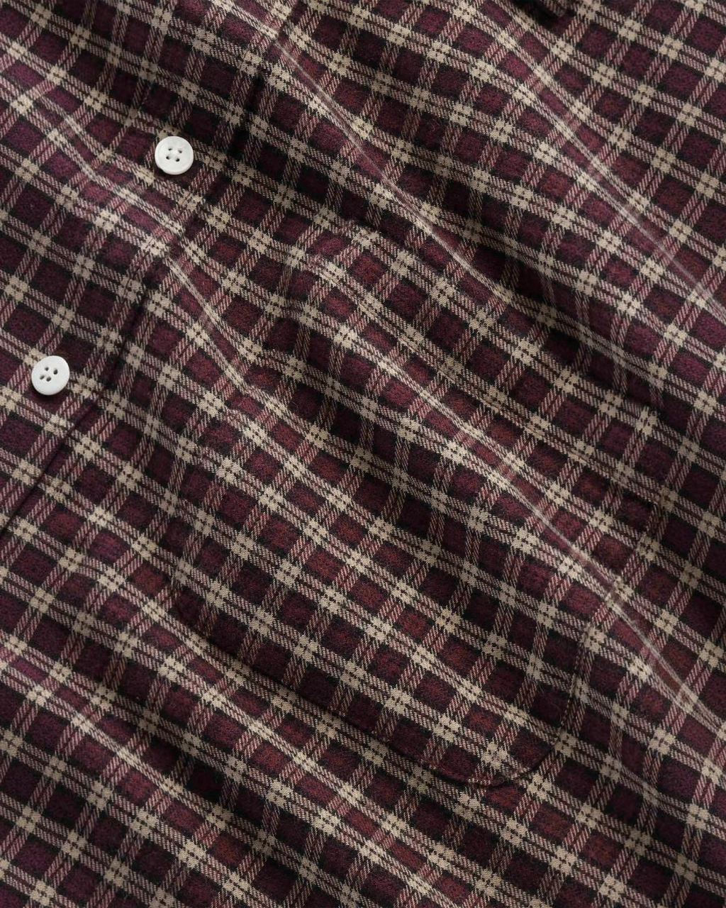 Chemise en flanelle de coton biologique à carreaux marron et beige de la marque Merci Paris avec poche poitrine