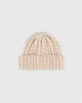 Bonnet Merci Paris Howlin' en laine d'agneau beige avec maille torsadée et large revers, fabriqué en Écosse