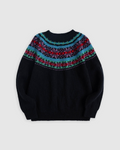 Pull Merci Paris Howlin' en laine Shetland noire avec empiècement jacquard coloré inspiré du style Fair Isle
