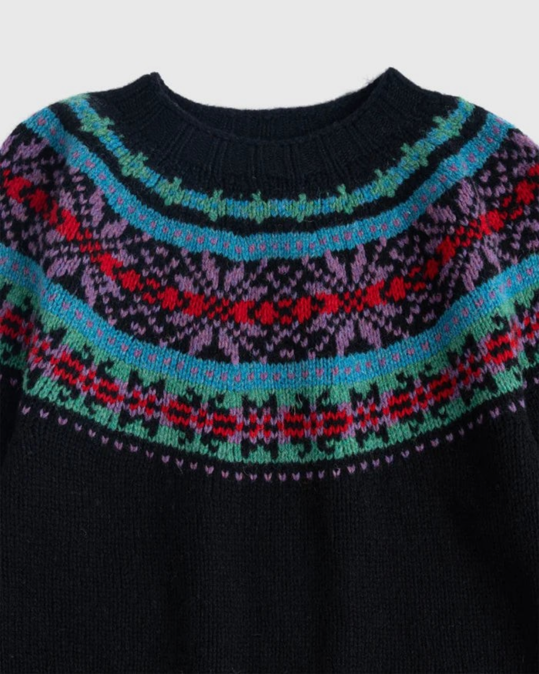 Pull Merci Paris Howlin' noir en laine Shetland avec empiècement jacquard circulaire aux motifs colorés Fair Isle