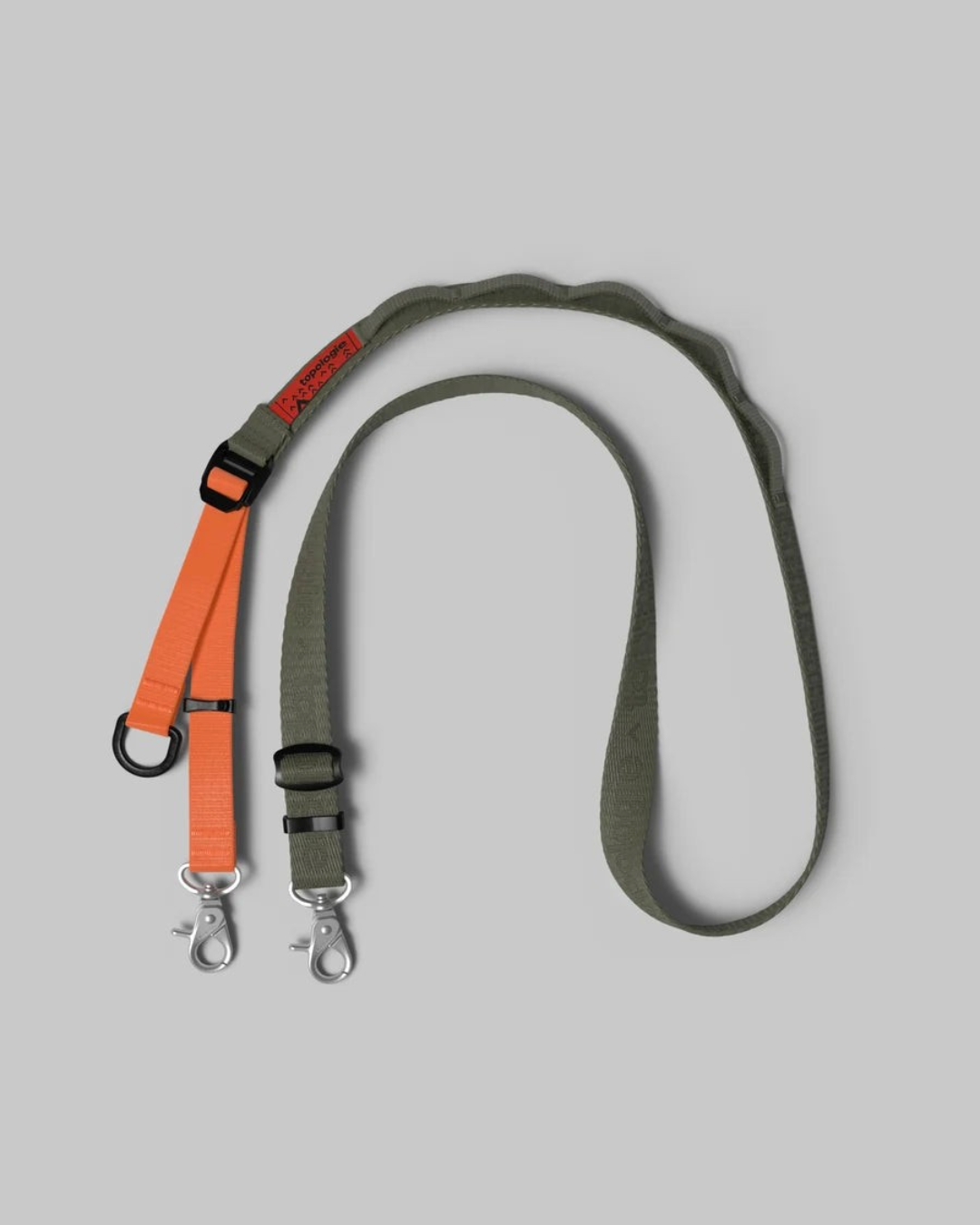 Sangle ajustable Utility Sling Merci Paris en nylon vert kaki avec détails orange et mousquetons métalliques