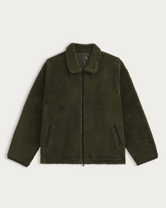 Veste polaire kaki Homecore Keafur avec col et finitions en moleskine, disponible chez Merci Paris