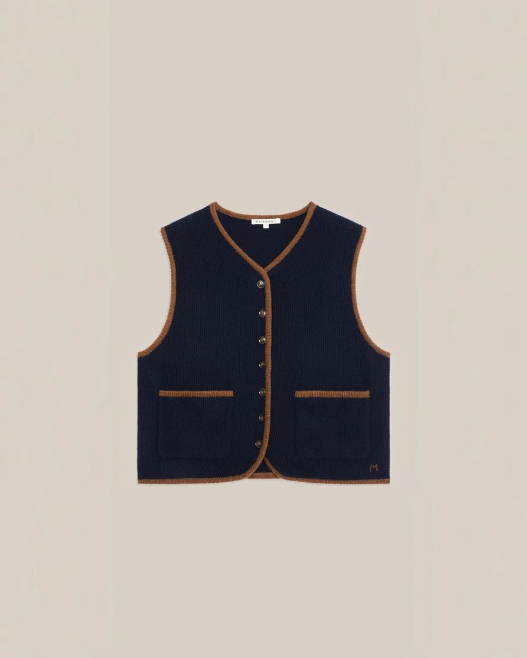 Gilet sans manches Merci Paris Moismont Angele en laine mérinos bleu marine avec finitions contrastées marron