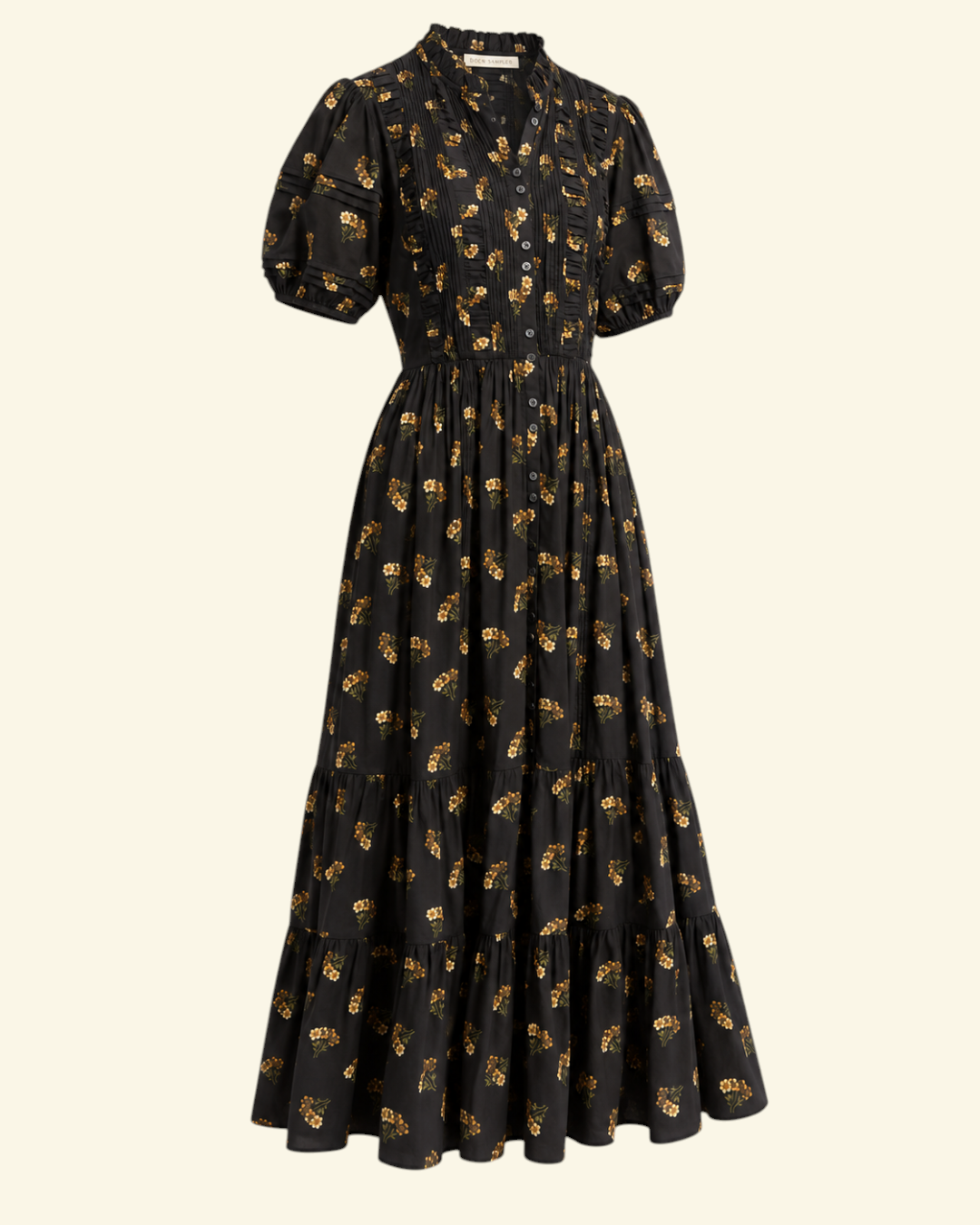 Robe midi Merci Paris Dôen Haleigh noire à fleurs, col montant volanté, manches bouffantes et jupe à volants étagés.