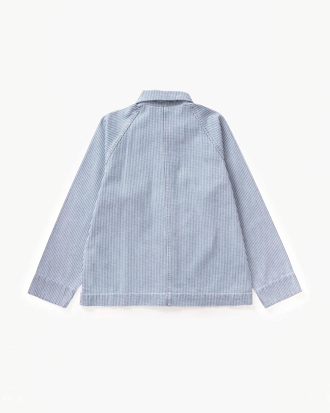 Vue arrière de la surchemise Vichy bleue Service Works en coton biologique avec manches raglan, vendue par Merci Paris
