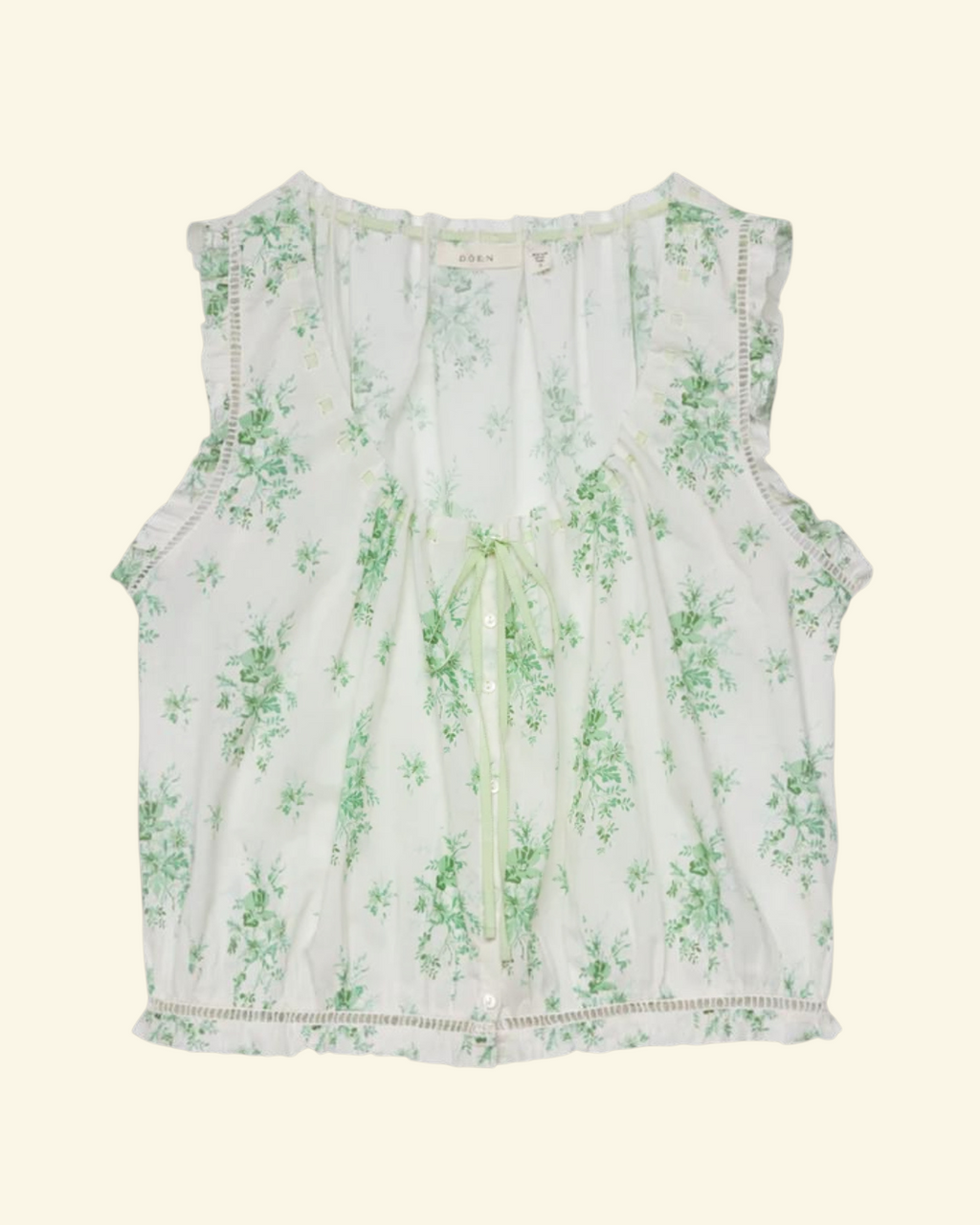 Blouse Merci Paris Dôen Traveler en voile de coton biologique vert à imprimé floral avec détails ajourés et ruban